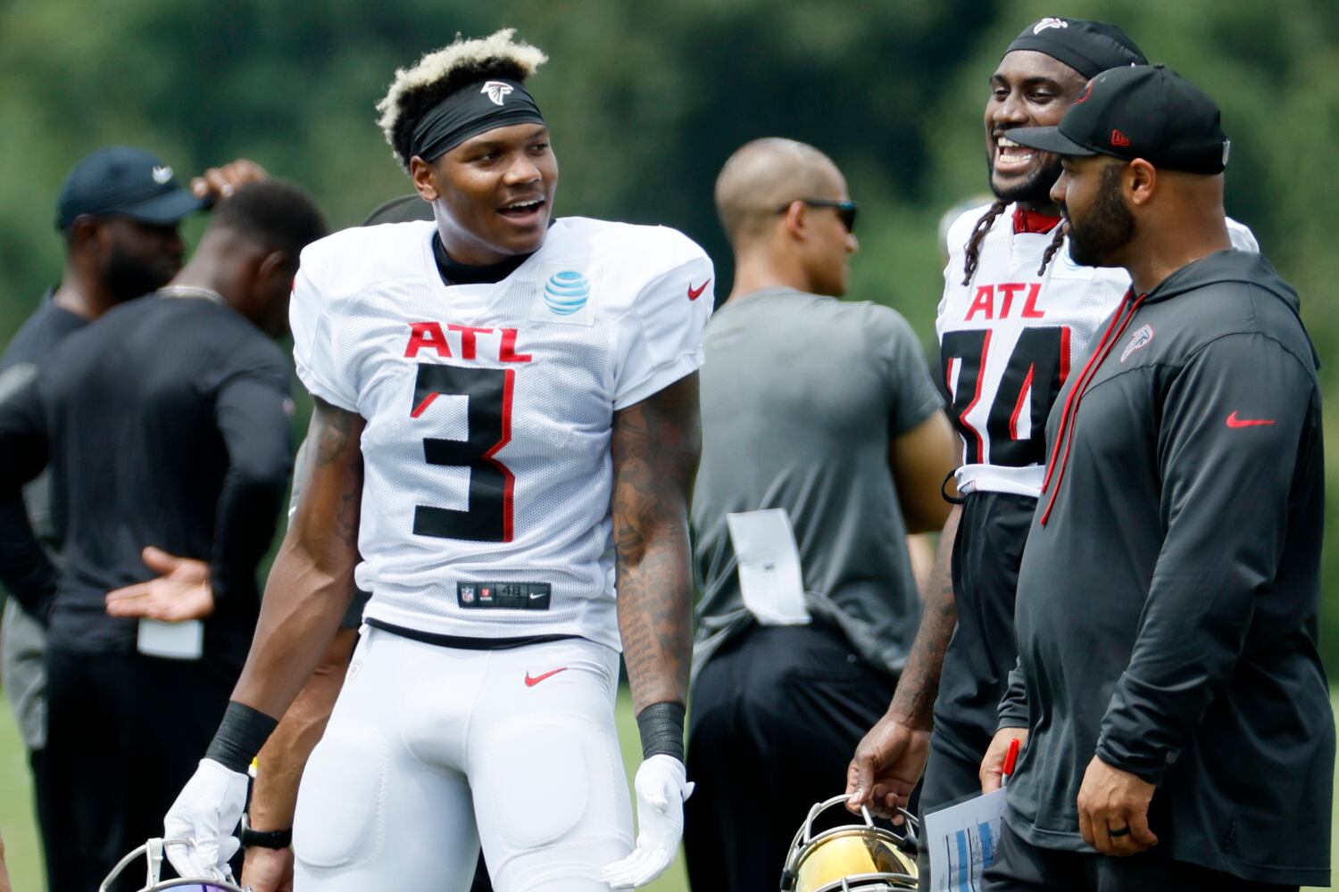 Atlanta Falcons linebacker Mikal Walker (3) speaks with Falcons wide receiver Cordarrelle Patterson (84) and running back coach Michael Pitre during a joint training camp with the Jacksonville Jaguars at the Falcons Practice Facility on Wednesday, August 24, 2022, in Flowery Branch, Ga. Miguel Martinez / miguel.martinezjimenez@ajc.com