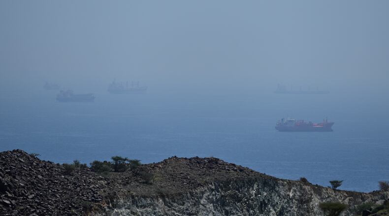 Tankers and bulk carriers anchored in the Strait of Hormuz, Saturday, April 18, 2026. (AP Photo)