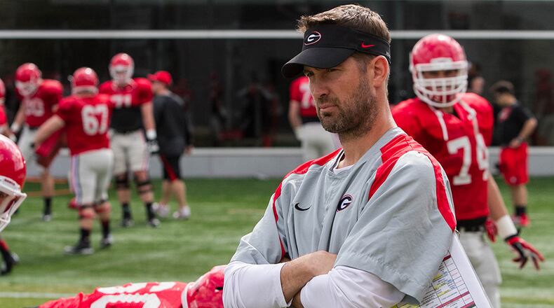Georgia's new offensive coordinator Brian Schottenheimer has been working with the Bulldogs' quarterbacks.