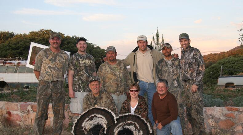 A photo from a 2010 hunt for Gould's wild turkeys in Zacatecas, Mexico, includes Gary Green, front left with bird, Howard Wohlgefardt, far left, and Paul A. Smith, far right. (Paul A. Smith/Milwaukee Journal Sentinel/TNS)