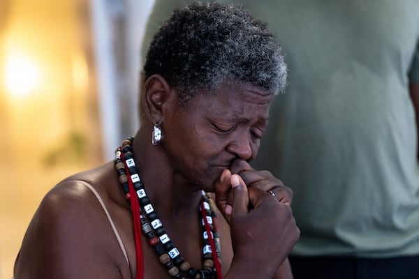 Lolita Griffeth cries as she speaks about her late long-time boyfriend Cornelius Taylor, Thursday, July 10, 2025. (Ben Hendren for the AJC)