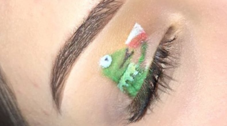 One woman painted a meme frog on her eyelid.