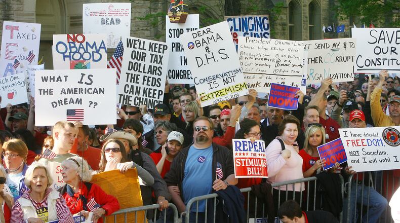 In this AJC file photo from April 15, 2009, tea partyists pack Washington Street in front of the state Capitol.