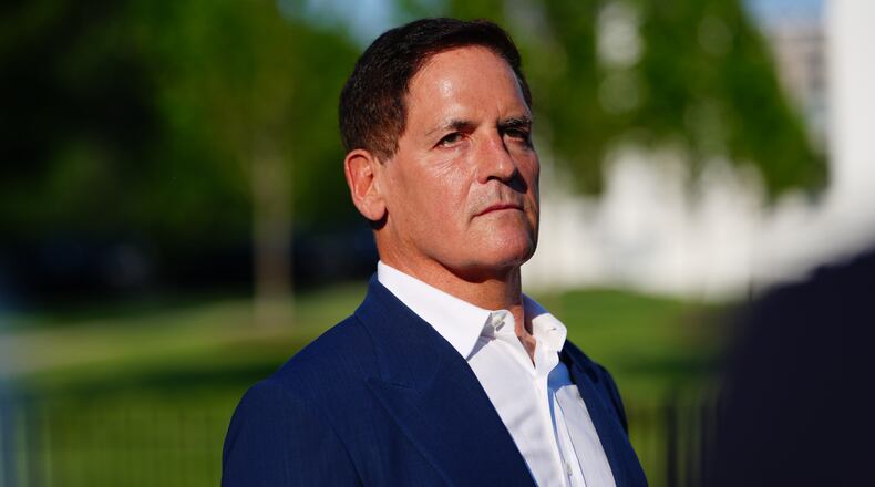 FILE - Mark Cuban talks with reporters after an event at the White House, May 18, 2026, in Washington. (AP Photo/Julia Demaree Nikhinson, File)