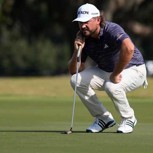 Andrew Novak lines up a putt on the nineth green during the second round of the RSM Classic golf tournament, Friday, Nov. 21, 2025, in St. Simons Island, Ga. (AP Photo/Mike Stewart)