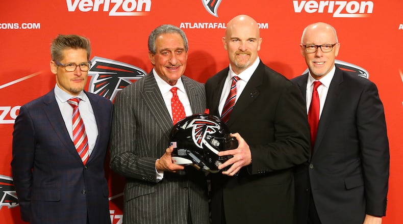 020315 FLOWERY BRANCH: General Manager Thomas Dimitroff (from left), owner Arthur Blank, head coach Dan Quinn and President and CEO Rich McKay pose for a photo at the end of a news conference introducing Quinn as coach on Tuesday, Feb 3, 2015, in Flowery Branch. Quinn, 44, spent the past two seasons as the Seattle Seahawks defensive coordinator after holding the same position at the University of Florida. Curtis Compton / ccompton@ajc.com The Falcons' heirarchy (Thomas Dimitroff, Arthur Blank, new coach Dan Quinn and Rich McKay) will take a hit from the NFL. (Curtis Compton, AJC)