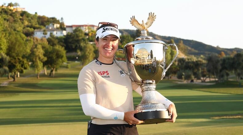 Hannah Green poses with the trophy after winning the LPGA JM Eagle LA Championship golf tournament at El Caballero Country Club Sunday, April 19, 2026, in Los Angeles. (AP Photo/Jessie Alcheh)