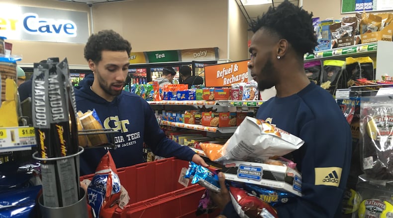 Georgia Tech guards Jose Alvarado (left) and Bubba Parham (right) compare snacks at a Speedway gas station in Winston-Salem, N.C., February 19, 2020. (Ken Sugiura/AJC)