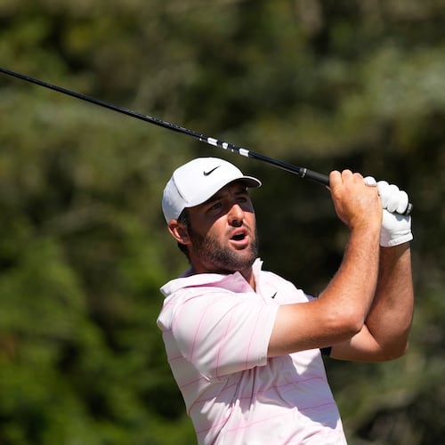 Scottie Scheffler watches his tee shot on the sixth hole during the final round of the U.S. Open golf tournament at Shinnecock Hills Golf Club in Southampton, N.Y., Sunday, June 21, 2026. (AP Photo/David J. Phillip)