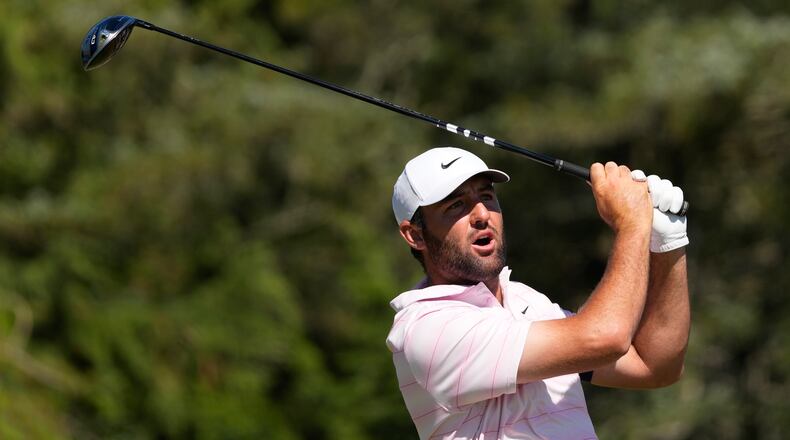Scottie Scheffler watches his tee shot on the sixth hole during the final round of the U.S. Open golf tournament at Shinnecock Hills Golf Club in Southampton, N.Y., Sunday, June 21, 2026. (AP Photo/David J. Phillip)