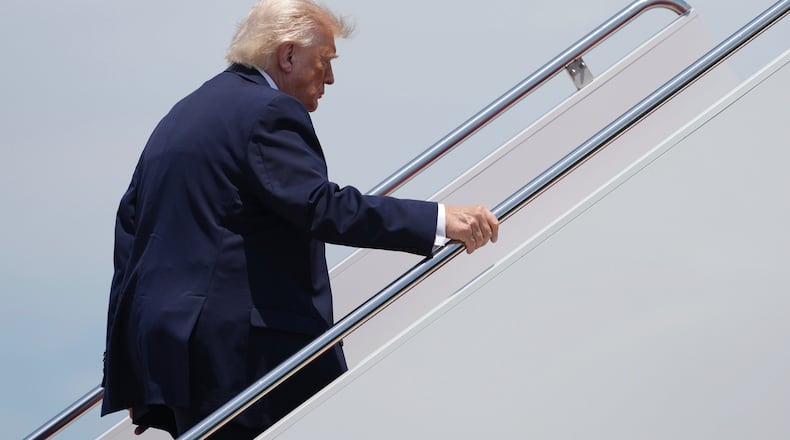 President Donald Trump boards Air Force One, Friday, June 5, 2026, at Joint Base Andrews, Md. (AP Photo/Mark Schiefelbein)