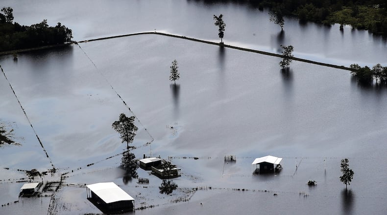 A call center operator is seeking 500 temporary employees, including in Augusta, to handle calls from people seeking aid after Hurricane Harvey. Shown is a ranch near Beaumont, Texas, hit by the storm. (Photo by Justin Sullivan/Getty Images)