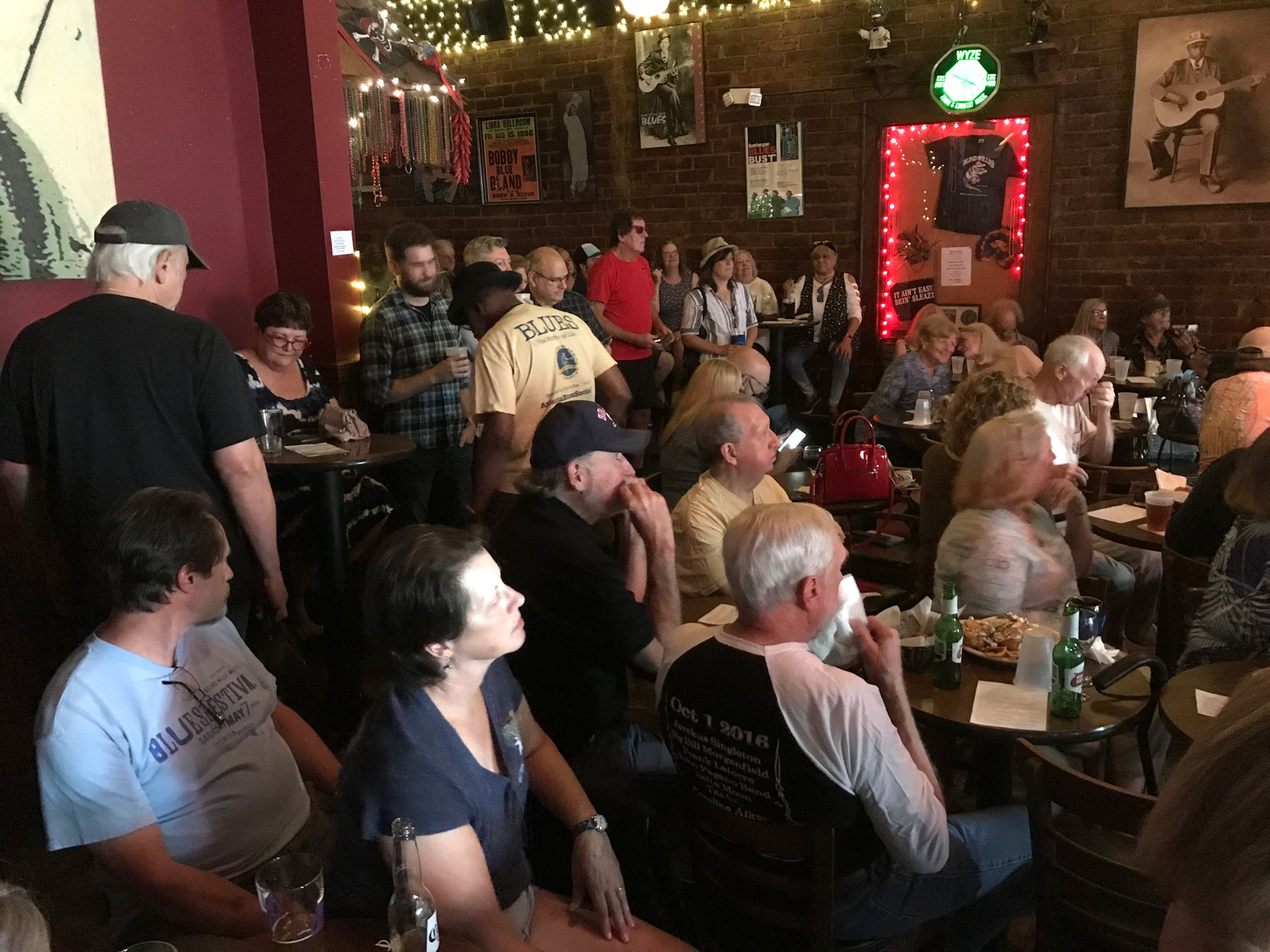 An Atlanta Blues Society gathering slides into Blind Willie’s. Monthly meetings bring members together for socializing, performances from invited bands, impromptu jams and raffle prizes. (Courtesy of Michael Davis)