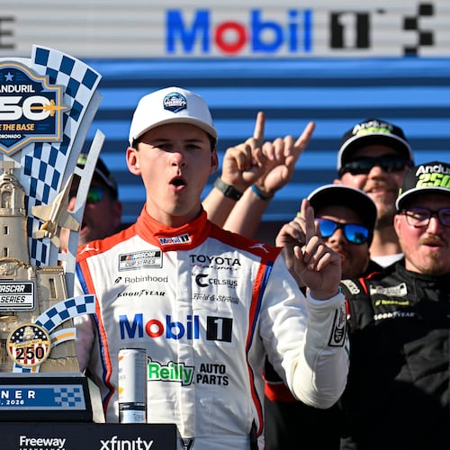 Cory Heim celebrates in Victory Lane after winning a NASCAR Cup Series auto race, Sunday, June 21, 2026, in Coronado, Calif. (AP Photo/Denis Poroy)