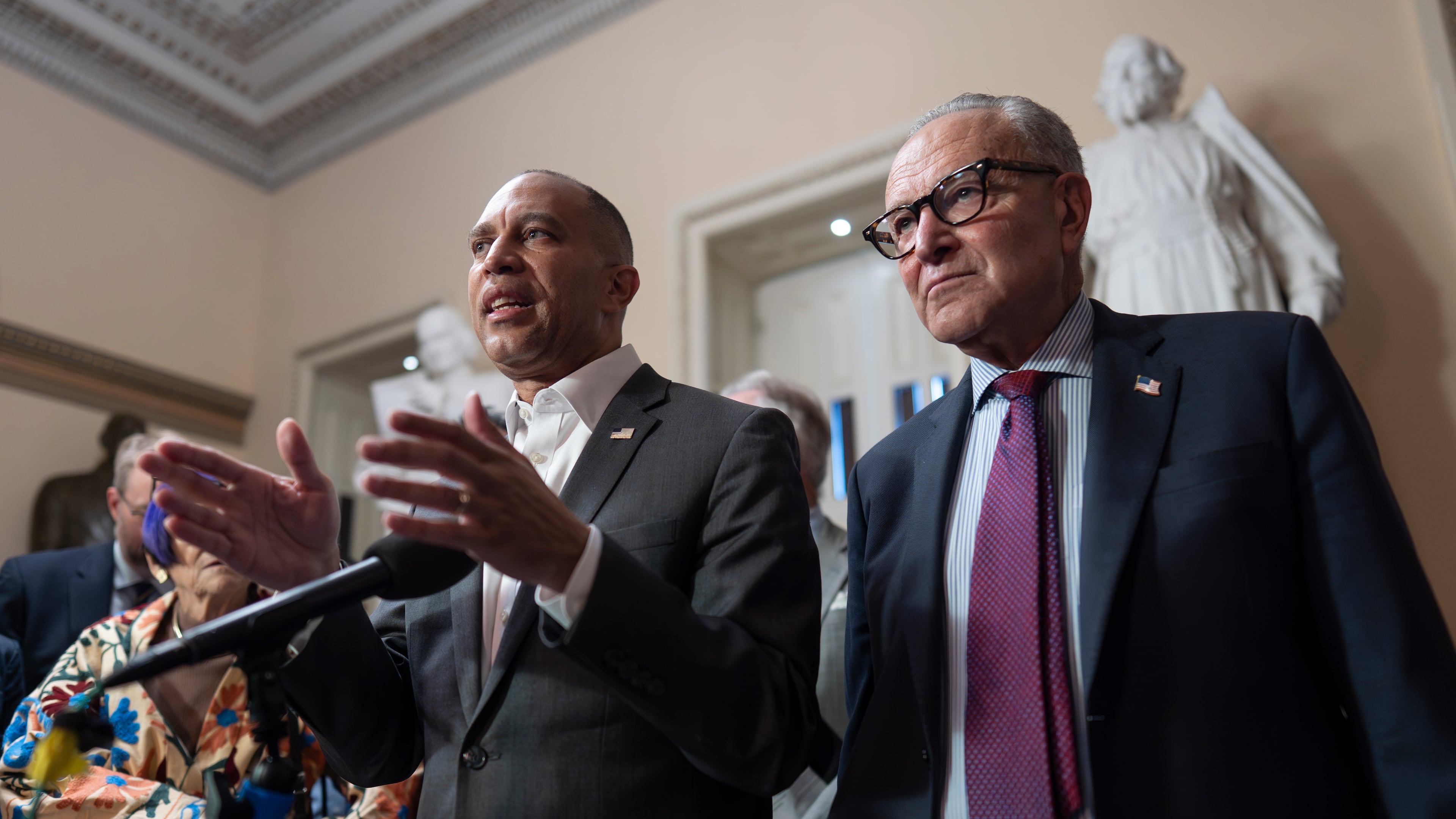 House Democratic Leader Hakeem Jeffries, left, and Senate Democratic Leader Chuck Schumer, both of New York, tell reporters that they are united as the Sept. 30 funding deadline approaches, at the Capitol in Washington, Thursday, Sept. 11, 2025. (AP Photo/J. Scott Applewhite)