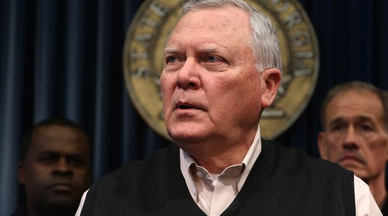 Georgia Gov. Nathan Deal responds to a question about the state's response to the snow storm during a press conference Wednesday, Jan. 29, 2014, in the Governor's office at the State Capitol.