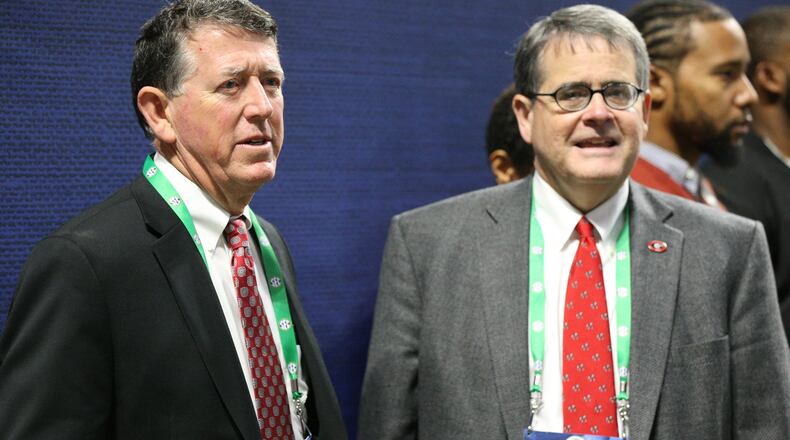 UGA President Jere Morehead (R), here with Athletic Director Greg McGarity at the end of the Bulldogs' 2017 SEC championship win over Auburn, was appointed to the NCAA's highest boards on Thursday. Curtis Compton / ccompton@ajc.com