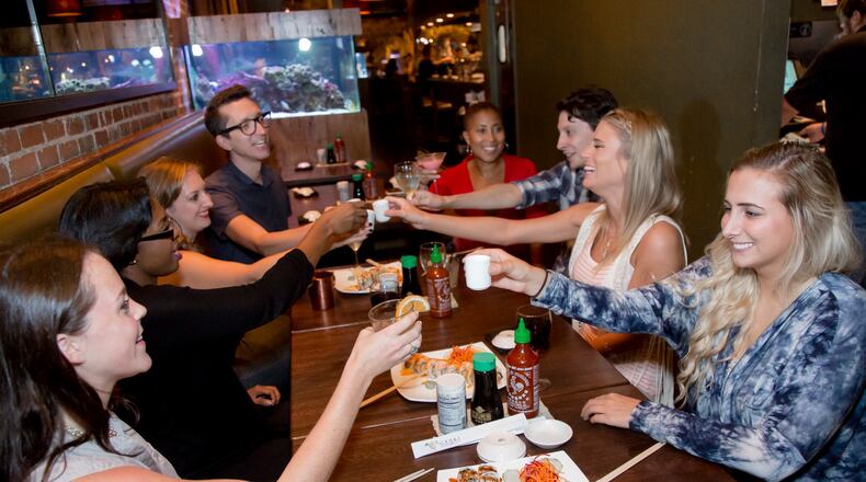 Food no longer will have to be served to those who would like to drink alcoholic beverages on Sundays, according to a new law passed by the Marietta City Council. AJC file photo