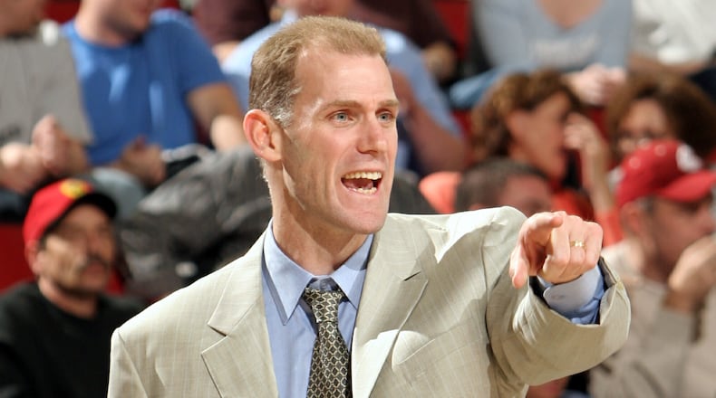 Interim head coach Chris Jent of the Orlando Magic calls a play in the game against the Seattle SuperSonics on March 18, 2005 at Key Arena in Seattle, Washington. (Photo by Otto Greule/Getty Images)