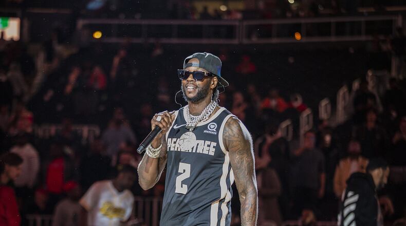 2 Chainz performed with Sleepy Rose, an artist on his T.R.U. record label, at halftime during the first Peachtree Night at State Farm Arena on Nov. 20, 2019. The rapper's record label now has a partnership with Atlantic Records. Photo: Terence Rushin/Courtesy of the Atlanta Hawks