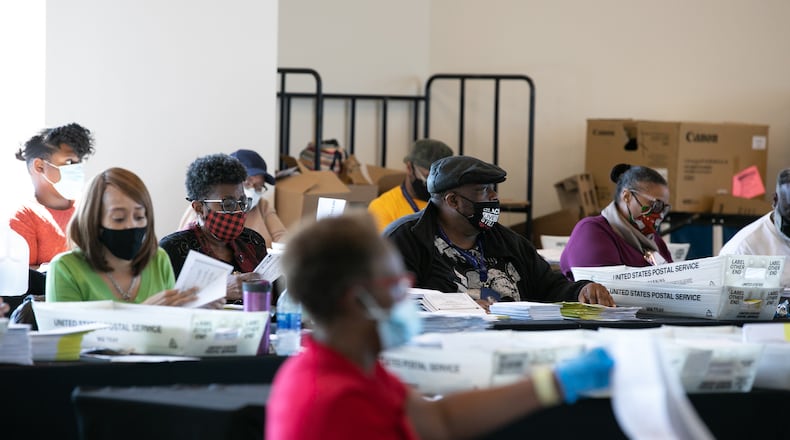 Election workers count Fulton County ballots at State Farm Arena on November 4, 2020 in Atlanta, Georgia. (Jessica McGowan/Getty Images/TNS)