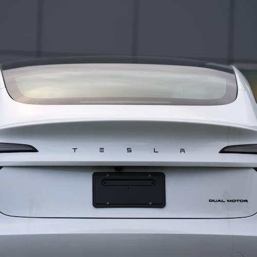 FILE - A Tesla vehicle is seen at a Tesla facility Wednesday, April 15, 2026, in Portland, Ore. (AP Photo/Jenny Kane, File)