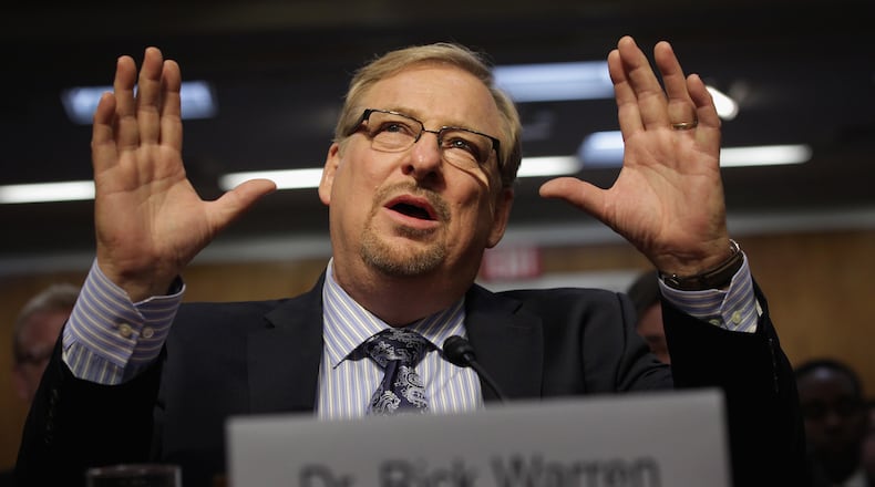 Pastor of the Saddleback Church Rick Warren speaks during a hearing before the State, Foreign Operations and Related Programs Subcommittee of the Senate Appropriations Committee May 6, 2015, on Capitol Hill in Washington, D.C. (Alex Wong/Getty Images/TNS)