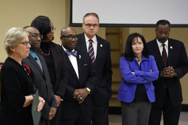 DeKalb County commissioners at a 2017 meeting. Nancy Jester (second from right, in blue jacket) was the only dissenter on Tuesday, February 27, 2018, when commissioners voted to give themselves a 60 percent raise. (DAVID BARNES / david.barnes@ajc.com)