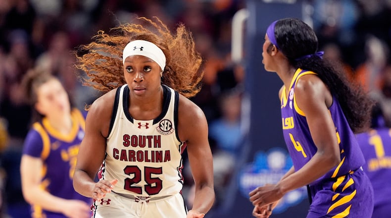 South Carolina guard Raven Johnson celebrates after scoring against LSU during the first half of an NCAA college basketball game in the semifinals of the Southeastern Conference tournament, Saturday, March 7, 2026, in Greenville, S.C. (AP Photo/Chris Carlson)