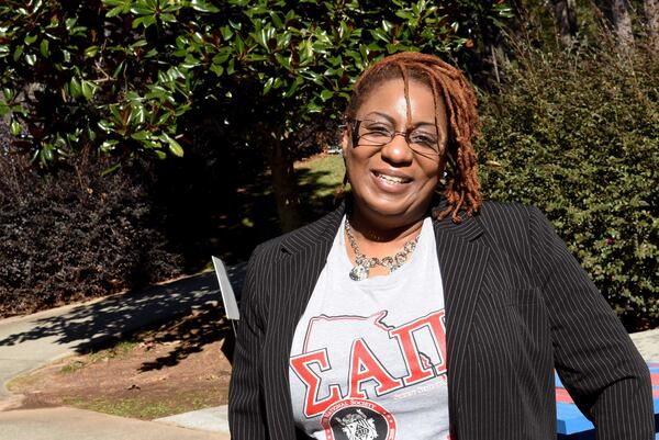 Feb. 3, 2021 -- Aliyah Johnson, a longtime Clayton County hairdresser, said that after years of chemically relaxing her, she went natural a decade ago and has been an advocate of natural hair. The Clayton County Commission on Tuesday passed the CROWN Act, an ordinance that makes it illegal for county businesses, housing providers or others in public accommodations to discriminate based on cultural hair textures and hairstyles. (Ryon Horne / Ryon.Horne@ajc.com)
