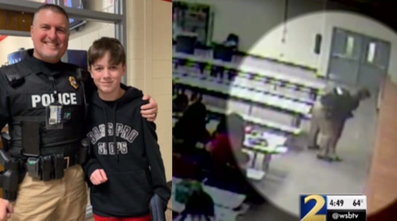 Officer Duane Smith (left) saved Ethan Hamrick, who was choking on a bottle cap at school earlier this week.