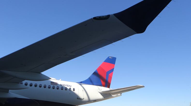 A wingtip and tail section of Delta Air Lines’ new A220 aircraft is seen on Monday, Oct 29, 2018, in Atlanta. Curtis Compton/ccompton@ajc.com
