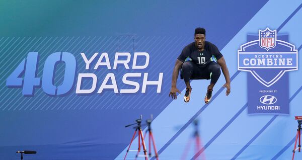Georgia linebacker Leonard Floyd jumps before running at the NFL football scouting combine Sunday, Feb. 28, 2016, in Indianapolis. (AP Photo/Darron Cummings)