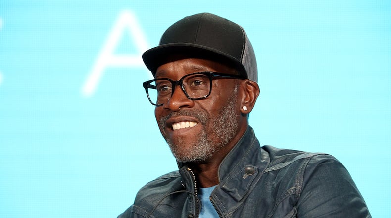 Don Cheadle  wore a T-shirt that read, "protect trans kids" while hosting "SNL" for the first time Saturday.