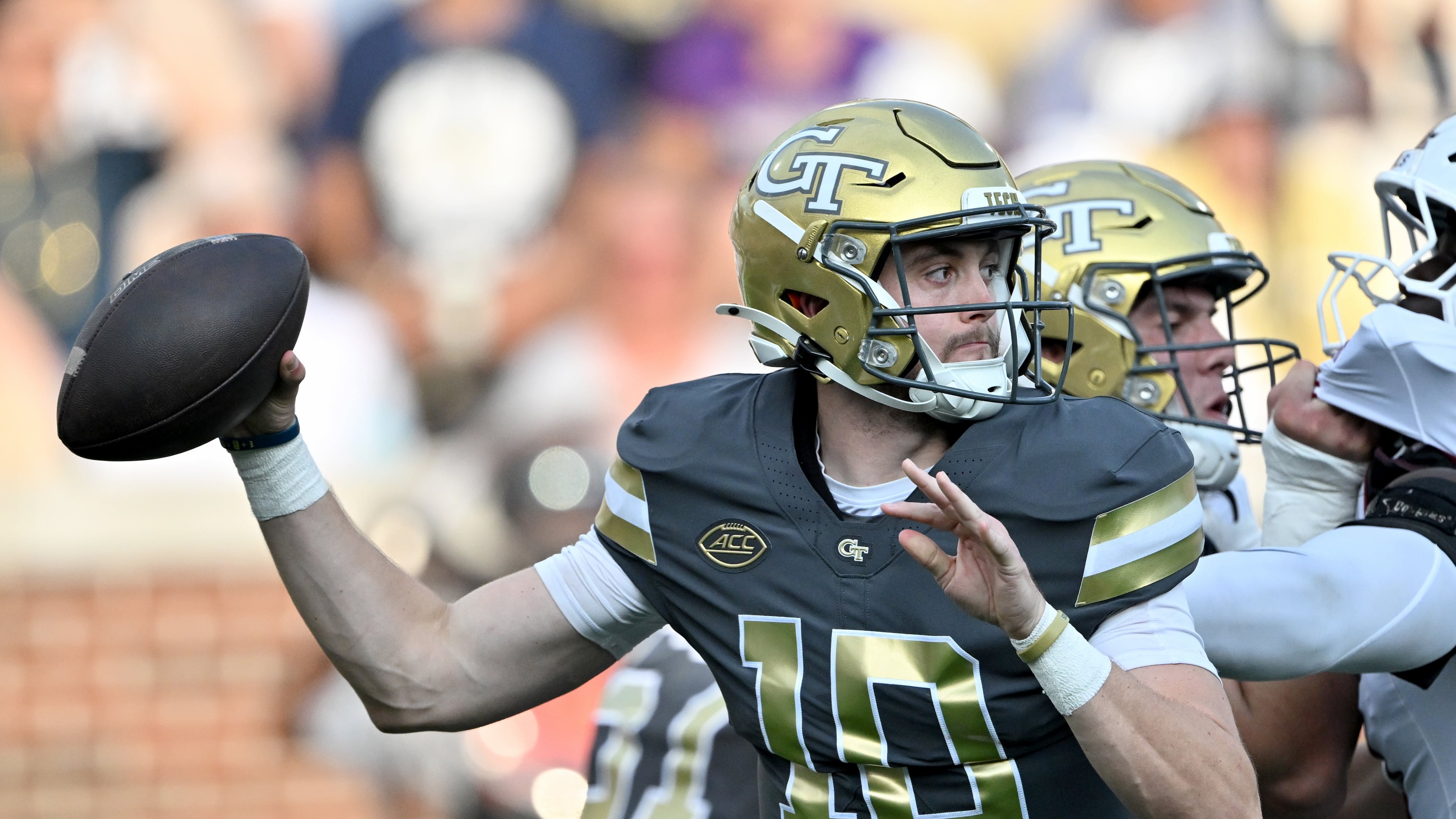 Georgia Tech quarterback Haynes King gets off a pass during the first half of an NCAA college football game at Georgia Tech's Bobby Dodd Stadium, Saturday, Sept. 20, 2025, in Atlanta. (Hyosub Shin/AJC)