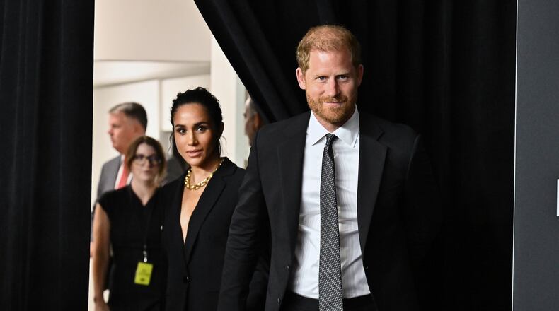 Meghan Markle, left, and Prince Harry, The Duke and Duchess of Sussex, attend the third annual World Mental Health Day Gala, hosted by Project Healthy Minds, at Spring Studios on Thursday, Oct. 9, 2025, in New York. (Photo by Evan Agostini/Invision/AP)