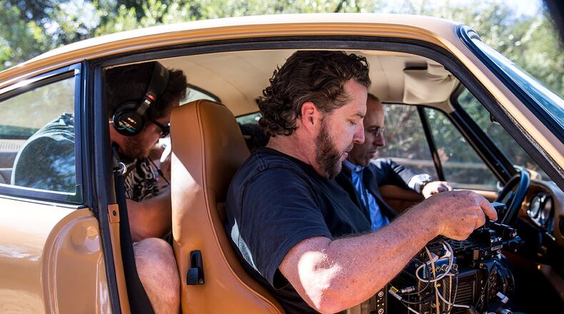 John Taggart (in the passenger seat) with Jerry Seinfeld (in the driver's seat, of course). CREDIT: courtesy of John Taggart