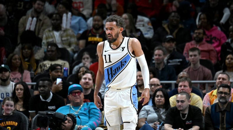 Atlanta Hawks guard Trae Young (11) reacts during the second half in an NBA basketball game at State Farm Arena, Friday, February 28, 2025, in Atlanta. Oklahoma City Thunder won 135-119 over Atlanta Hawks. (Hyosub Shin / AJC)