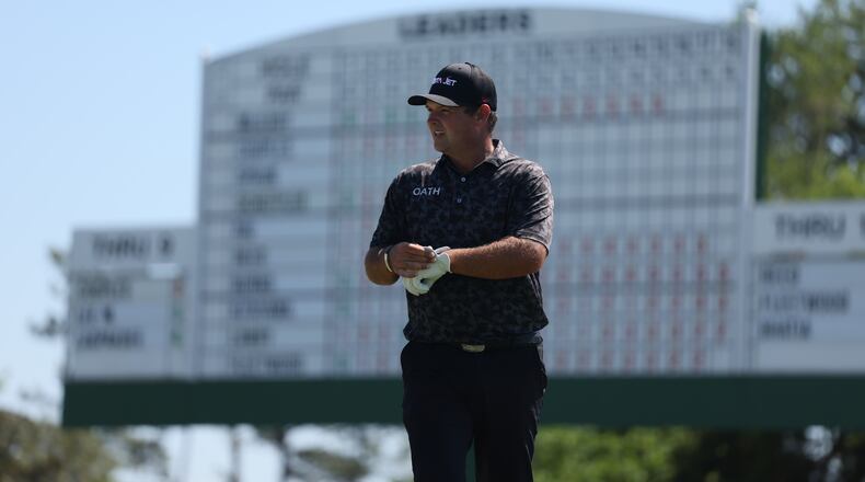 Patrick Reed prepares to hit his third shot on the 18th hole during first round of the Masters tournament, at Augusta National Golf Club, Thursday, April 9, 2026, in Augusta, Ga. (Jason Getz/AJC)