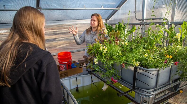 Cornerstone Preparatory Academy teacher Terri Haas (right, CQ) talks to her students about the school's Hydroponic garden at the Acworth campus on January 25th, 2019. For AJC Top Workplaces story. (Photo by Phil Skinner)