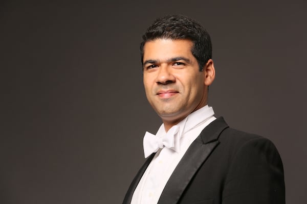 Paul Bhasin takes the baton of the DeKalb Symphony Orchestra.
