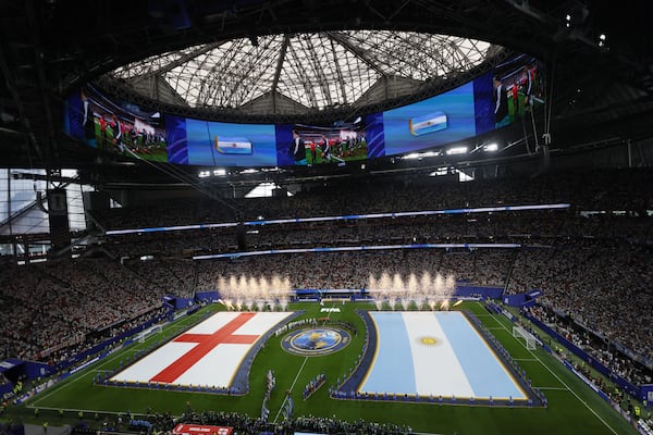 Fireworks go off after playing national anthems before start of Argentina vs. England FIFA World Cup Semifinal match at Atlanta Stadium (Mercedes-Benz Stadium) on Wednesday, July 15, 2026.  (Miguel Martinez/AJC)
