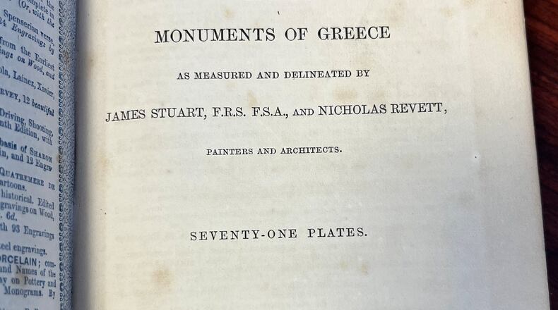 In this photo provided by Catherine Taylor a page of the book "Antiquities of Athens," stamped by a library, is shown on Thursday, July 30, 2026, after its return in Kiama, Australia, an estimated 150 years late. (Catherine Taylor via AP)