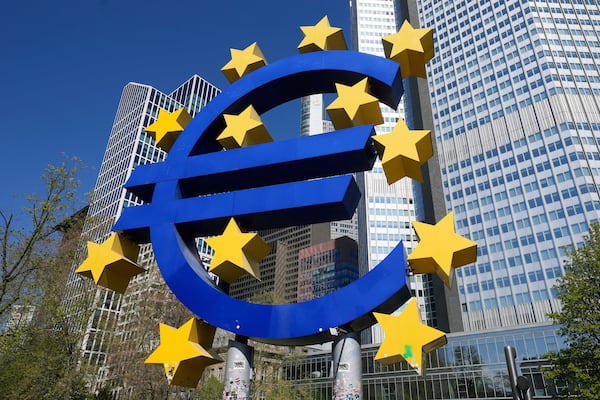 FILE - A view of the European currency Euro sculpture, at Germany's main financial district in Frankfurt, Germany, Wednesday, April 9, 2025. (AP Photo/Martin Meissner, File)