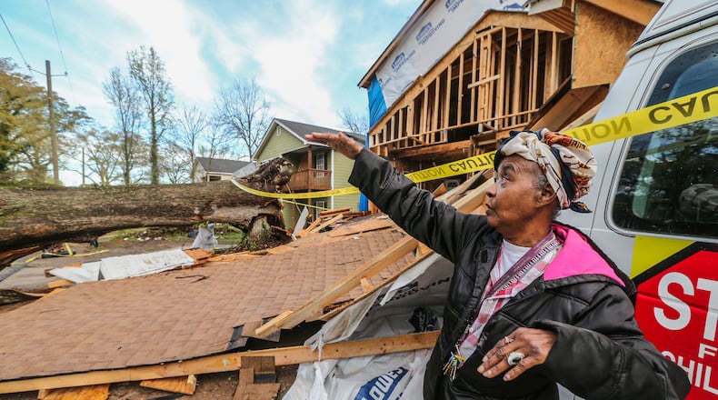 Rosie Gray's home was damaged when a storm sent a tree crashing into her house and two others.