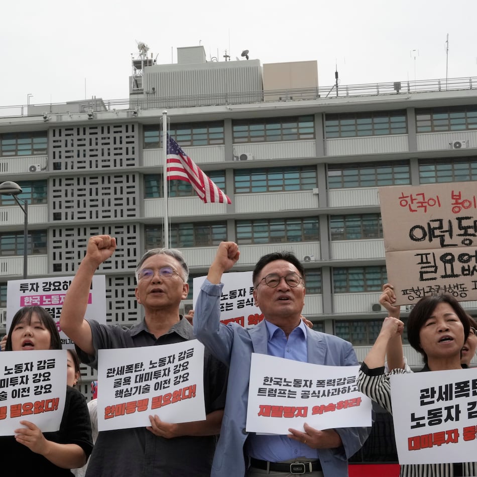 Protesters stage a rally near the U.S. Embassy in Seoul, South Korea, on Tuesday, Sept. 9, 2025. The people were protesting against the detention of South Korean workers after an immigration raid in Georgia, and many of the signs read "A tariff bomb and workers confinement." (Ahn Young-joon/AP)