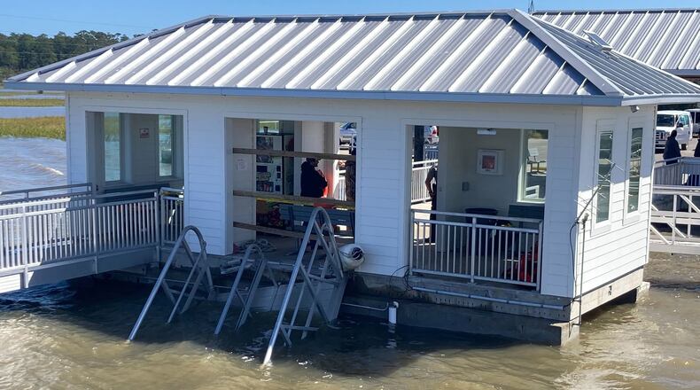 The ferry gangway can be seen partially in the water on Sunday, Oct. 20, 2024. A celebration of Gullah Geechee descendants of slaves turned tragic when the gangway collapsed Saturday afternoon on Sapelo Island in Georgia. (Adam Van Brimmer/AJC)