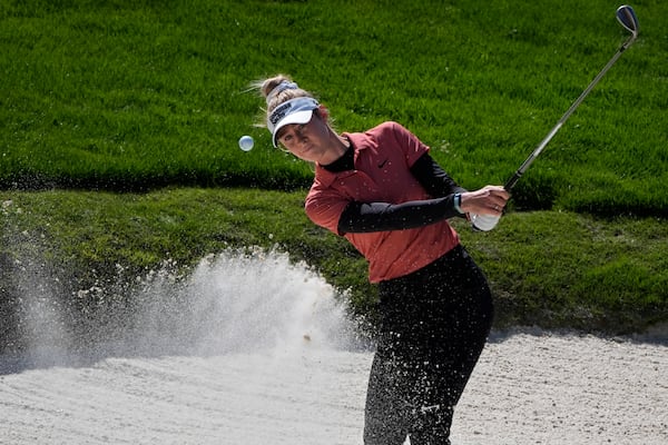 FILE - Nelly Korda hits out of a bunker at the fourth green during the final round of the LPGA T-Mobile Match Play golf tournament Sunday, April 7, 2024, in North Las Vegas, Nev. (AP Photo/John Locher, File)