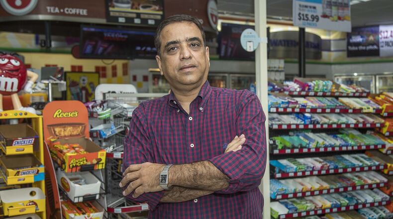 Shell gas station owner Suhel Kazani stands for a photo at his Snellville station Monday, April 6, 2020. Kazani owns seven Shell stations in metro Atlanta. Because of the coronavirus pandemic, his gasoline sales are way down, he said. (ALYSSA POINTER / ALYSSA.POINTER@AJC.COM)