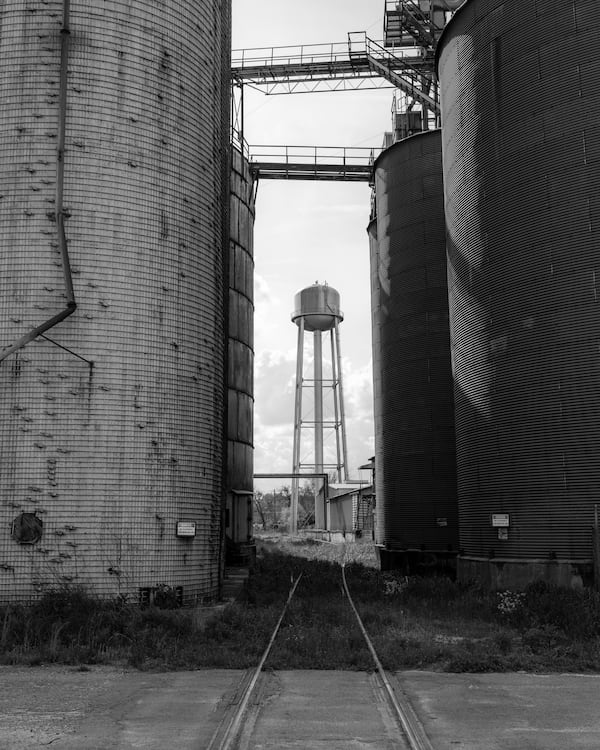 "Old Water Tower, Estill, South Carolina," a 2021 photograph by Parker Stewart. Photos of Georgia's coast by Stewart and Jack Leigh are on display at Laney Contemporary, a Savannah gallery, until Aug. 1, 2026. (Courtesy of Parker Stewart/Laney Contemporary)